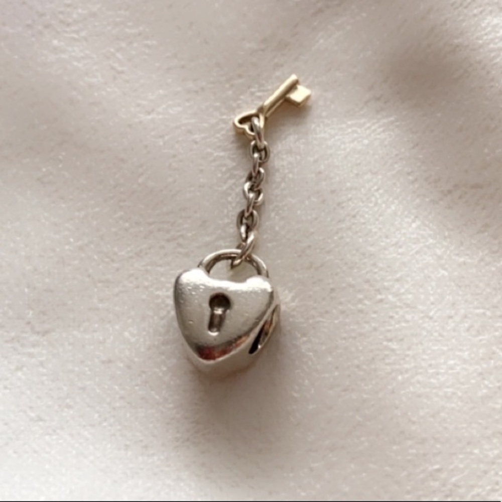 Authentic Pandora Heart locket and gold key charm